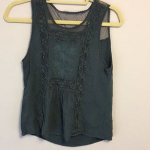 Mesh tank top with embroidery.